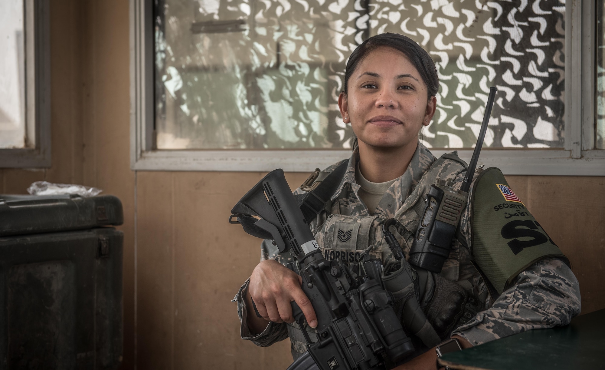 U.S. Air National Guard Tech. Sgt. Casey Morrison, a patrol team lead with the 407th Expeditionary Security Forces Squadron, smiles for a photo May 13, 2017, in Southwest Asia. Morrison is a member of the 254th Security Forces Squadron at Andersen Air Force Base, Guam, and deployed to the Air Force Central Command region in support of Operation Inherent Resolve.  She provides integrated base defense by performing base patrols and gate guard duties in defense of personnel assigned to the 407th Air Expeditionary Group. (U.S. Air Force photo by Staff Sgt. Alexander W. Riedel)