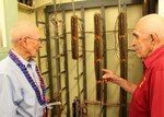 Col. John F. Miniclier, left, and Sgt. 1st Class Edgar R. Fox, both retired Marines who served at the Battle of Midway, examine a message routing switchboard during their tour of the former Station Hypo in Building #1 of the Pearl Harbor Naval Shipyard and Intermediate Maintenance Facility, June 2, 2017. The message routing board is one of the few remaining relics of the apparatus from Station Hypo, which deciphered the Japanese Imperial Navy code leading to the U.S. victory at the Battle of Midway June 4-6, 1942. The retired Marines were among a small group who toured the site of Station Hypo following a ceremony commemorating the 75th anniversary of the victory at Midway, often considered the turning point of the war in the Pacific. 