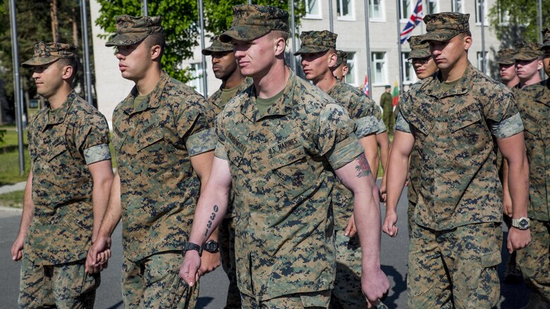 ADAZI, Latvia-Marines with the Black Sea Rotational Force 17.1 march in formation in preparation for the opening ceremony of Exercise Saber Strike 17 at Camp Adazi, Latvia, June 3, 2017.  The combined training prepares NATO Allies and partners to respond faster to regional crises and meet their own security needs by improving the security of borders and countering threats. (U.S. Marine Corps photo by Cpl. Devan Alonzo Barnett/Released)