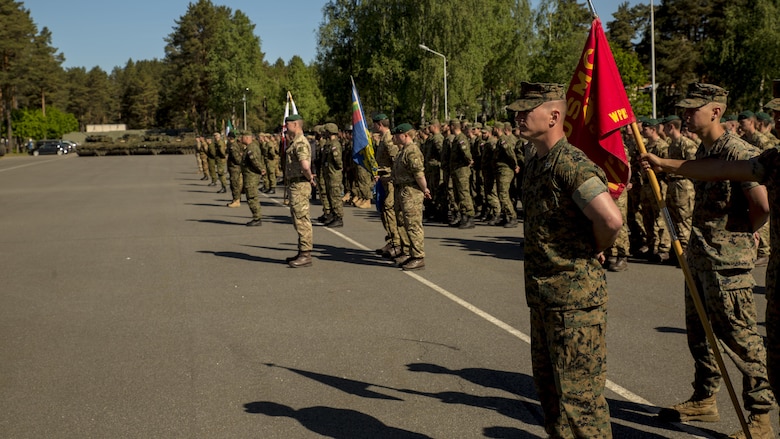 ADAZI, Latvia-Marines with the Black Sea Rotational Force 17.1 stand in formation next to several other international military forces, to include Latvia, Italy, Great Britain, Lithuania, Norway, Poland, Slovenia and Slovakia, in preparation for the opening ceremony of Exercise Saber Strike 17 at Camp Adazi, Latvia, June 3, 2017.  Exercise Saber Strike 17 is an annual combined-joint exercise conducted at various locations throughout the Baltic region and Poland. (U.S. Marine Corps photo by Cpl. Devan Alonzo Barnett/Released)
