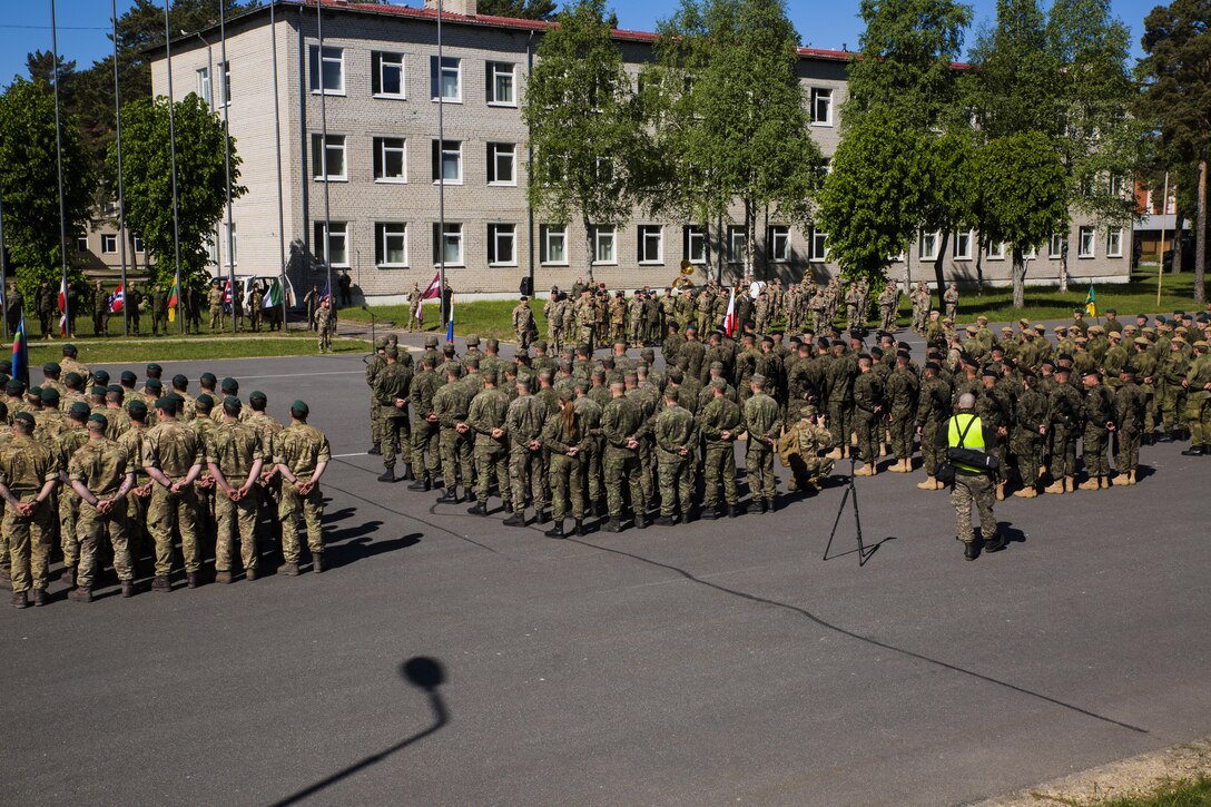 Several international military forces, to include Latvia, Italy, Great Britain, Lithuania, Norway, Poland, Slovenia and Slovakia, stand in formation during the opening ceremony of Exercise Saber Strike 17 at Camp Adazi, Latvia, June 3, 2017.  Exercise Saber Strike 17 is an annual combined-joint exercise conducted at various locations throughout the Baltic region and Poland. (U.S. Marine Corps photo by Cpl. Devan Alonzo Barnett/Released)