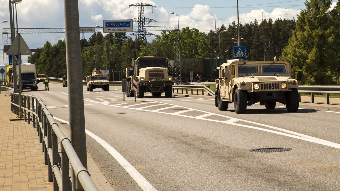SALASPILS, Latvia -- Marines with the Combat Logistics Battalion 25, 4th Marine Logistics Group, Marine Forces Reserve, transport equipment and personnel by convoy from Ventspils to Adazi, Latvia, during Exercise Saber Strike 17, June 2, 2017.  Exercise Saber Strike 17 is an annual combined-joint exercise conducted at various locations throughout the Baltic region and Poland. The combined training prepares NATO Allies and partners to effectively respond to regional crises and to meet their own security needs by strengthening their borders and countering threats. (U.S. Marine Corps photo by Cpl. Devan Alonzo Barnett/Released)