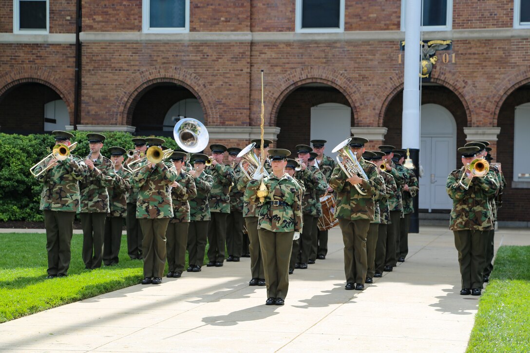 On Friday, May 26, 2017, Assistant Drum Major Gunnery Sgt. Stacie Crowther led the Marine Band during a parade rehearsal at Marine Barracks Washington. ((U.S. Marine Corps photo by Gunnery Sgt. Rachel Ghadiali/released)