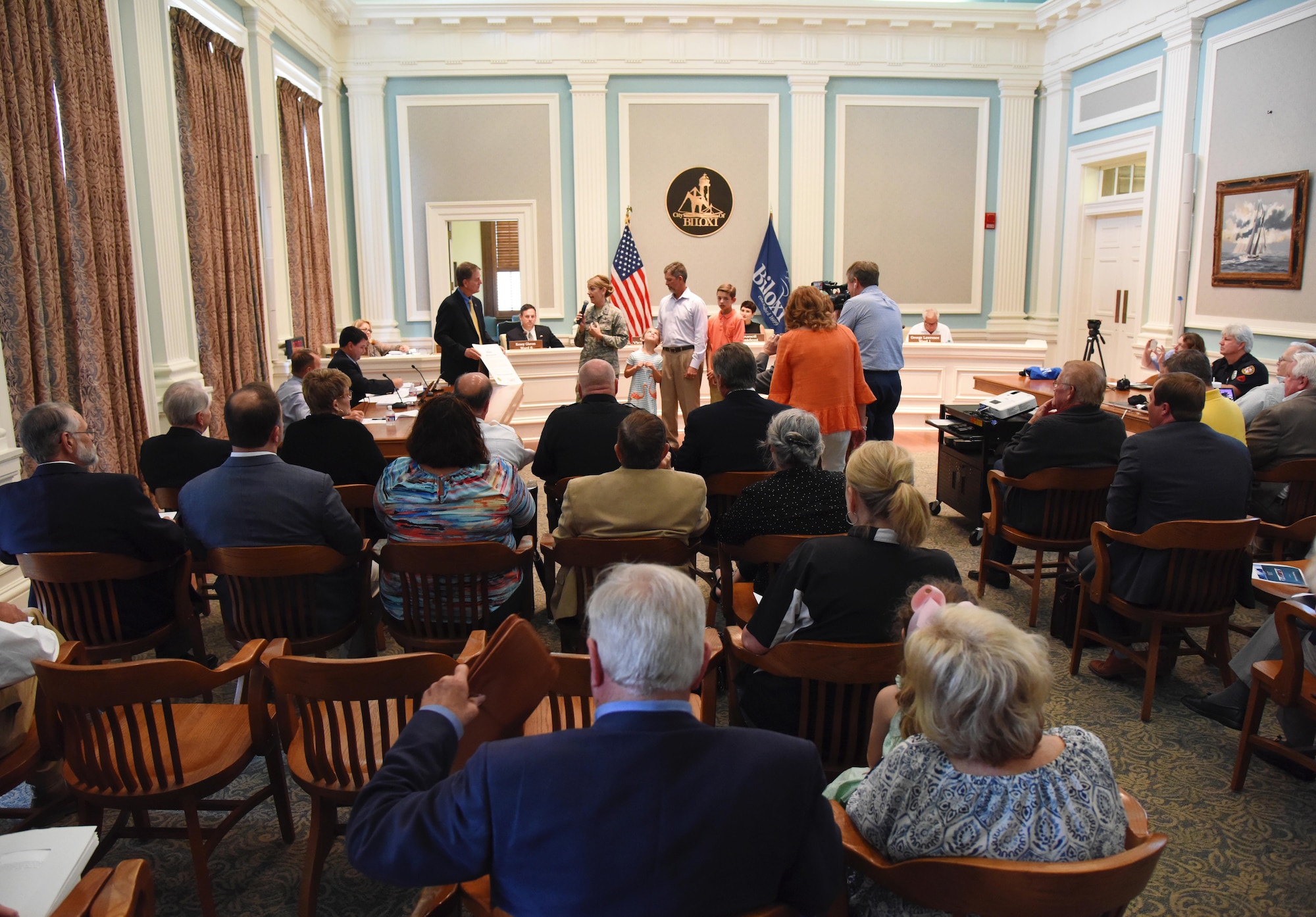 Col. Michele Edmondson, 81st Training Wing commander, delivers remarks during a recognition ceremony for at Biloxi City Hall May 30, 2017, in Biloxi, Miss. The mayor hosted the ceremony, during a Biloxi city council meeting, to recognize Edmondson and her family for their support to the city during her assignment at Keesler. (U.S. Air Force photo by Kemberly Groue)