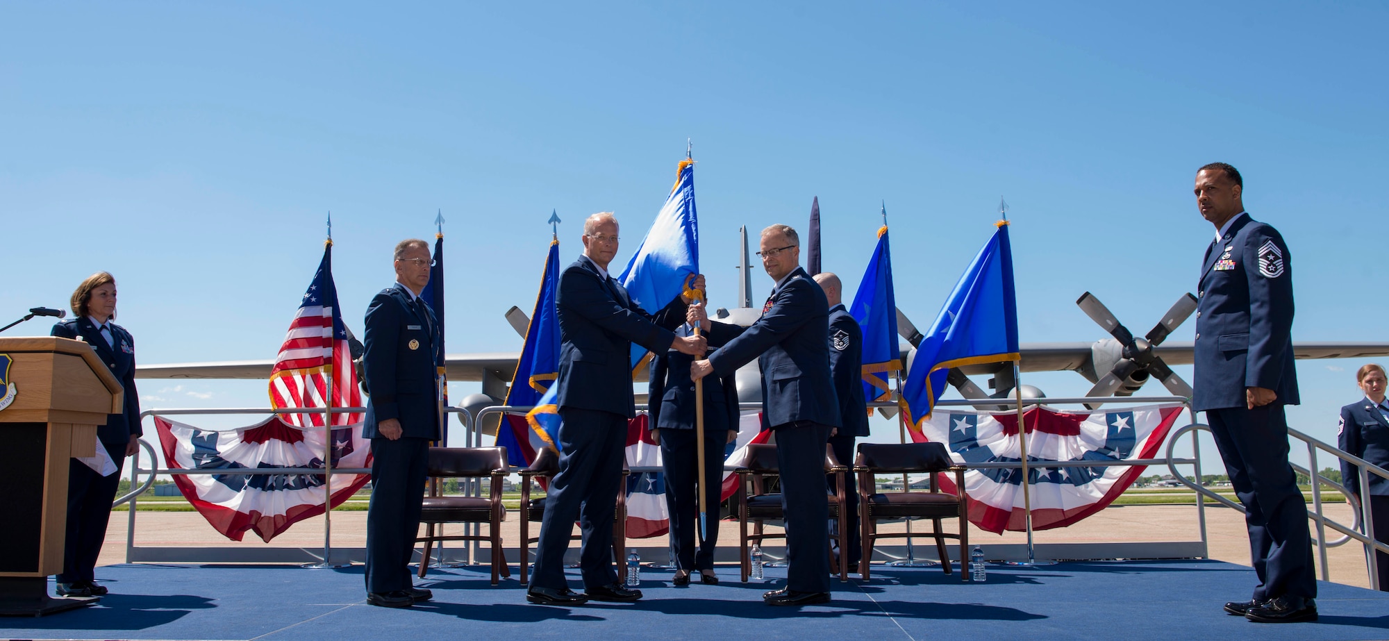 Col. Brian S. Bowman, 914th Air Refueling Wing Commander, relinquishes the 22nd Air Force flag to Brig. Gen. Steven B. Parker, 94th Airlift Wing Commander, Dobbins Air Reserve Base, GA, representing 22nd Air Force, during the Change of Mission Ceremony, June 3, 2017, Niagara Falls Air Reserve Station, N.Y. The Airlift Wing has been re-designated as an Air Refueling Wing, and as such, will fall under 4th Air Force moving forward. Under the new mission, the 914th will be flying the KC-135 Stratotanker. (U.S. Air Force photo by Tech. Sgt. Stephanie Sawyer) 