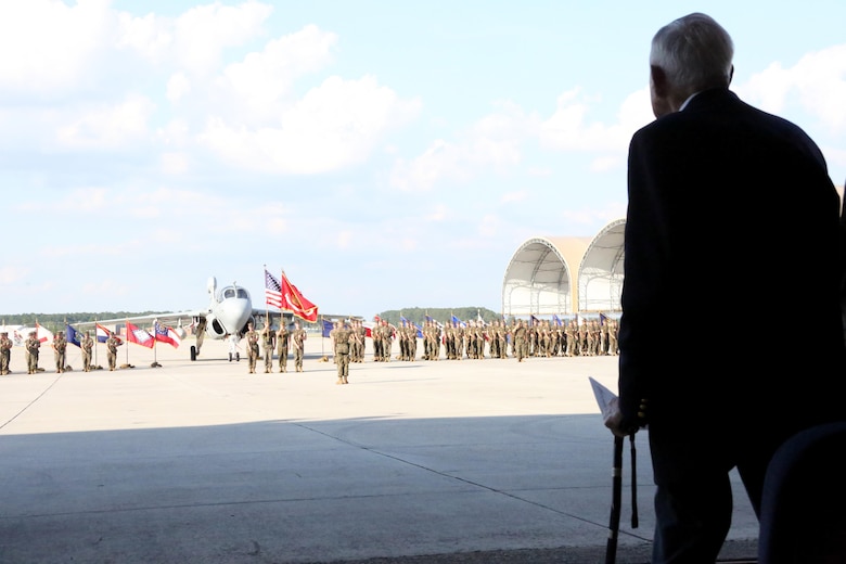 Retired Col. Thomas Murphree stands to honor the National Anthem during Marine Tactical Electronic Warfare Squadron 4’s deactivation ceremony at Marine Corps Air Station Cherry Point, N.C., June 2, 2017. Tracing their lineage back to Marine Composite Reconnaissance Squadron One in the 1950’s, VMAQ-4, Marine Aircraft Group 14, 2nd Marine Aircraft Wing, was activated Nov 7, 1981. Murphree is the former commanding officer of VMCJ-1, which evolved into VMAQ-4. (U.S. Marine Corps photo by Cpl. Jason Jimenez/ Released)