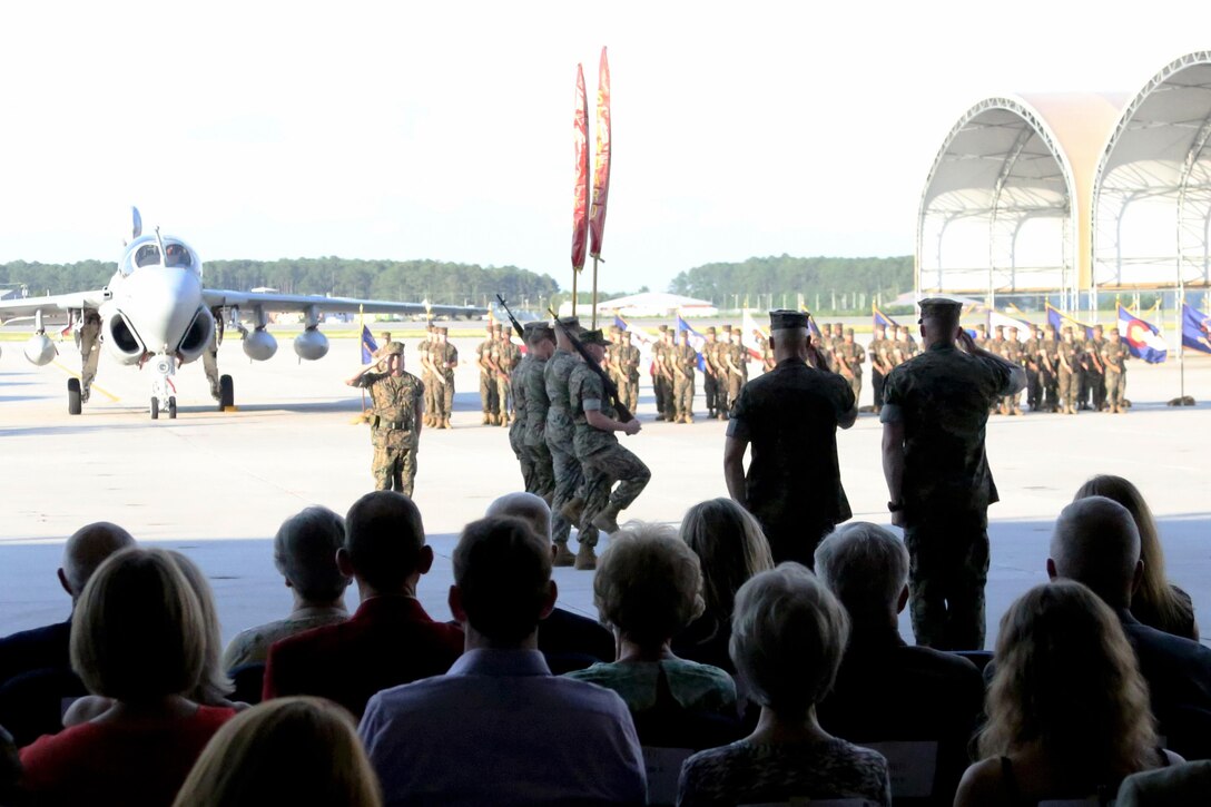 Marines with Marine Tactical Electronic Warfare Squadron 4 salute the cased colors during the unit’s deactivation ceremony at Marine Corps Air Station Cherry Point, N.C., June 2, 2017. In the last two years, VMAQ-4, Marine Aircraft Group 14, 2nd Marine Aircraft Wing, has supported two Red Flag exercises, two Weapons and Tactics Instructors courses, and a deployment to Turkey in support of Operation Inherent Resolve. VMAQ-4 was also recognized as the Marine Tactical Electronic Warfare Squadron of the year for 2016. (U.S. Marine Corps photo by Cpl. Jason Jimenez/ Released)