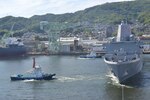 Tug boats pull amphibious transport dock USS Green Bay (LPD 20) from the pier at Fleet Activities Sasebo, Japan, June 2, 2017 so it can begin its routine patrol. Green Bay will operate in the Indo-Asia-Pacific region to enhance partnerships and be a ready-response force for any type of contingency. 