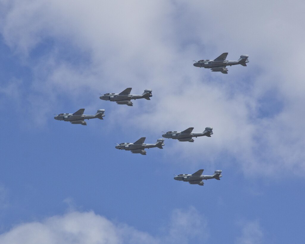 Six EA-6B Prowlers with Marine Tactical Electronic Warfare Squadron 4 take part in a flyover, Oct. 10, 2016. The squadron’s mission was to support the Marine Air-Ground Task Force commander by conducting airborne electronic warfare, day or night, under all weather conditions during expeditionary, joint, or combined operations. VMAQ-4 was assigned to Marine Aircraft Group 14, 2nd Marine Aircraft Wing. (U.S. Marine Corps courtesy photo/ Released)