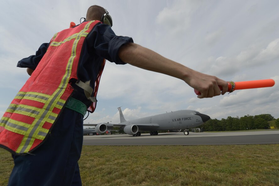 Staff Sgt. Joshua Kearney, 100th Aircraft Maintenance Squadron crew chief, marshalls a KC-135R Stratotanker
participating in BALTOPS exercise at Powidz Air Base, Poland, June 5, 2017. BALTOPS is an annually recurring
multinational exercise designed to enhance flexibility and interoperability, as well as demonstrate resolve of allied
and partner forces to defend the Baltic region. Participating nations include Belgium, Denmark, Estonia, Finland, France, Germany, Latvia, Lithuania, the Netherlands, Norway, Poland, Sweden, the United Kingdom, and the United States. (U.S. Air Force photo by Staff Sgt. Jonathan Snyder)
