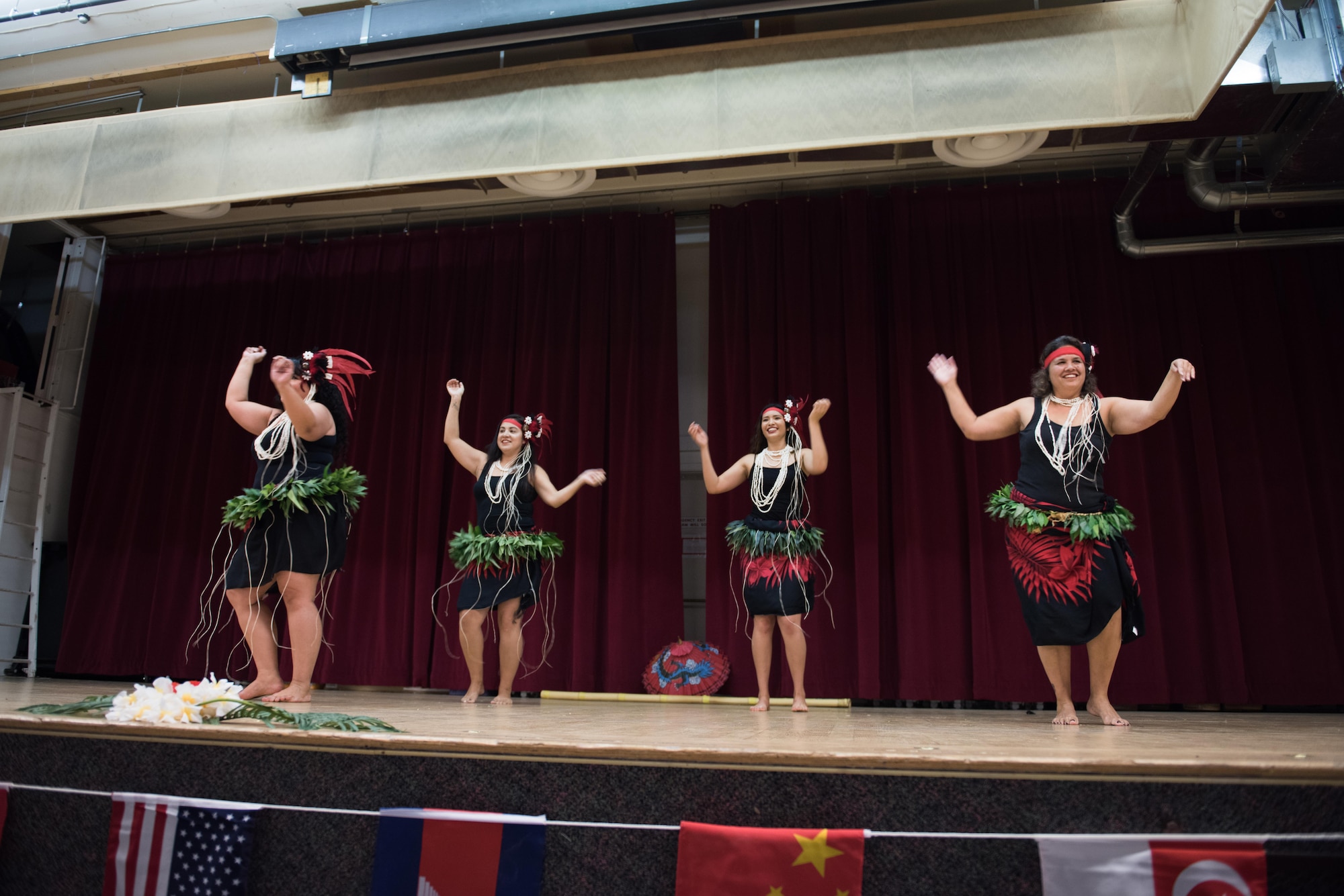 Traditional dances and music performances accompanied Far East and Pacific foods at the Asian-American Pacific Islander Heritage Month Culture Show and Food Tasting event at Stripes Lounge May 24. The event was the finale of AAPI month at Edwards. (U.S. Air Force photo by Joseph Gocong)
