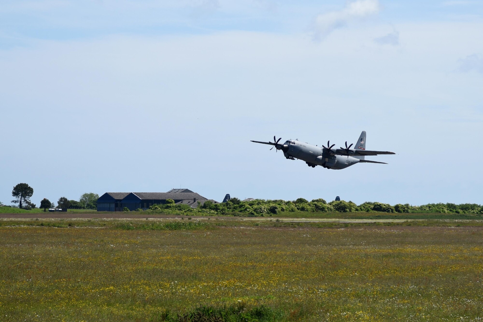 A crew from the 815th Airlift Squadron take off to conduct a 4-ship flyover at a ceremony in Normandy. This ceremony commemorates the 73rd anniversary of D-Day, the largest multi-national amphibious landing and operational military airdrop in history, and highlights the U.S.' steadfast commitment to European allies and partners. Overall, approximately 400 U.S. service members from units in Europe and the U.S. are participating in ceremonial D-Day events from May 31 to June 7, 2017(U.S. Air Force photo by Staff Sgt. Nicholas Monteleone)