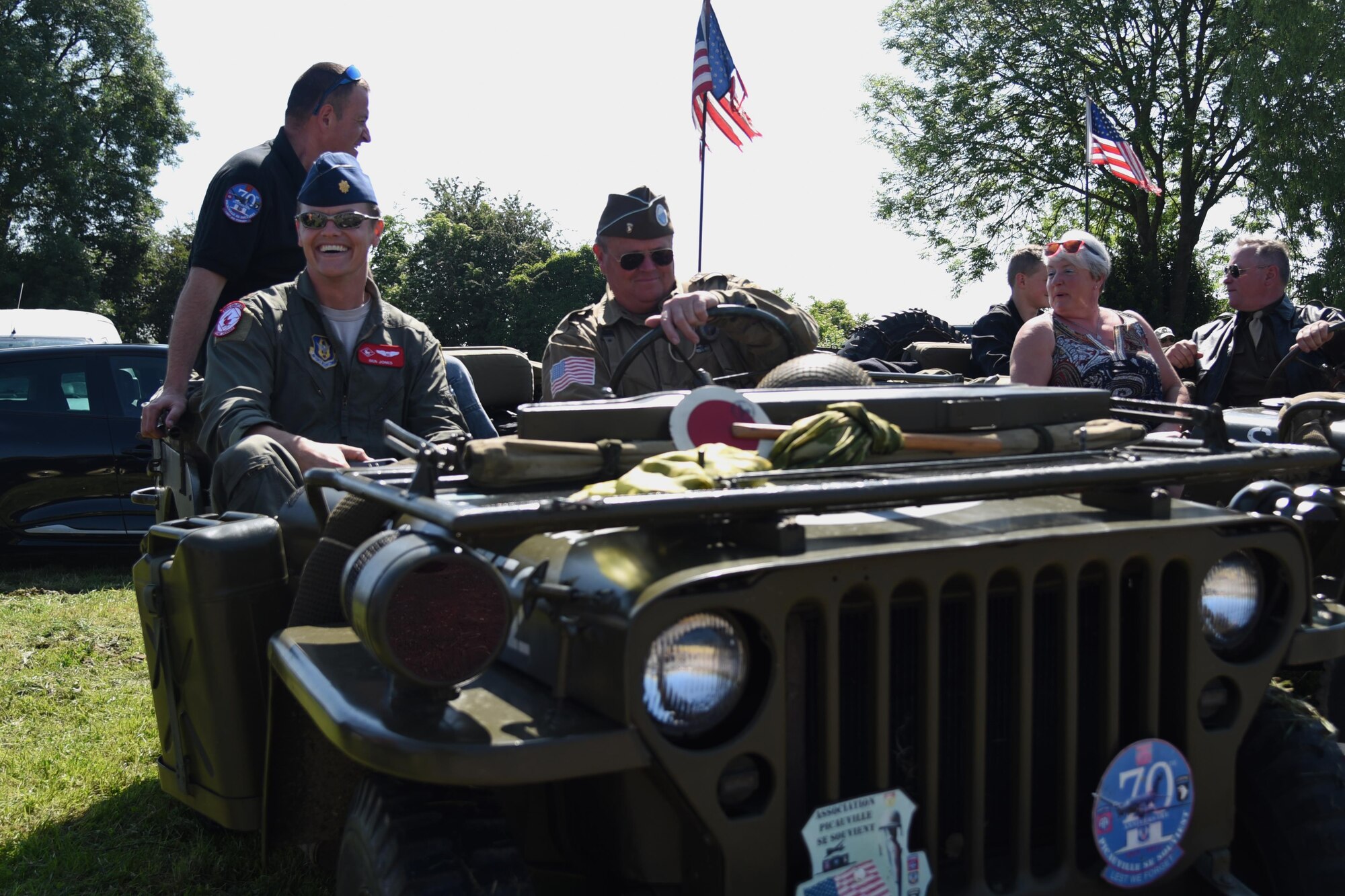 Maj. Ben Jones prepares for a ride in a WWII era Jeep following a ceremony in Picauville, France. This ceremony commemorated the 73rd anniversary of D-Day, the largest multi-national amphibious landing and operational military airdrop in history, and highlights the U.S.' steadfast commitment to European allies and partners. Overall, approximately 400 U.S. service members from units in Europe and the U.S. are participating in ceremonial D-Day events from May 31 to June 7, 2017(U.S. Air Force photo by Staff Sgt. Nicholas Monteleone)