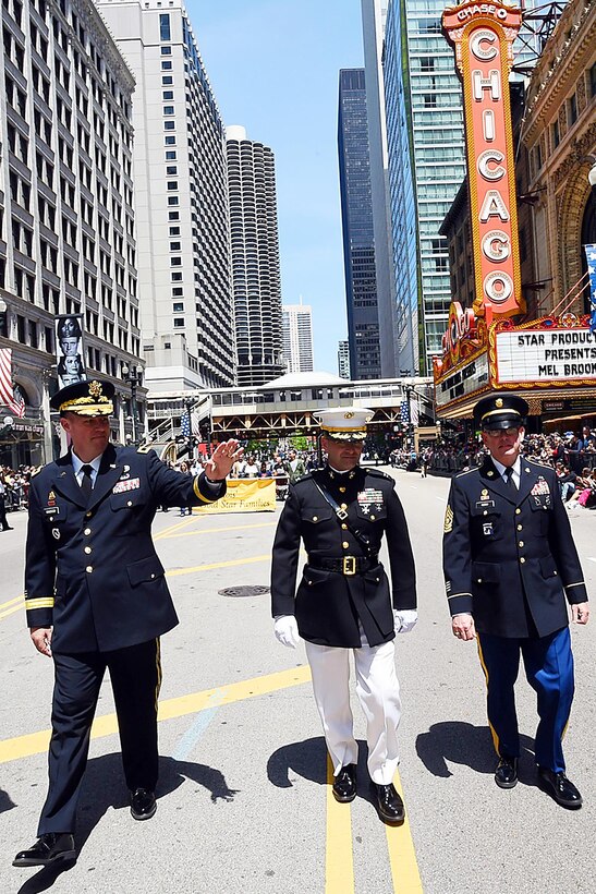 U.S. Army Reserve Brig. Gen. Frederick R. Maiocco Jr. (left) Commanding General, 85th Support Command, and Command Sgt. Maj. Vernon Perry III (right) Command Sergeant Major, 85th Support Command walk down State Street during the City of Chicago’s Memorial Day parade, May 27, 2017. This was Maiocco’s third and final time participating in Chicago’s Memorial Day observance before he moves onto his next duty assignment. 
(U.S. Army photo by Sgt. Aaron Berogan/Released)