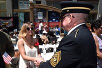 Command Sgt. Maj. Vernon Perry III, Command Sergeant Major, 85th Support Command shakes the hand of Shelby Iubel, wife of Pfc. Tyler Iubelt, thanking her for the sacrifice her husband made. Iubelt, who served with the First Cavalry Sustainment Brigade, was killed in Afghanistan on November 12, 2016. S. Iubelt said she was honored to see so many people reach out to show her and her mother-in-law so much love and support. Iubelt and her mother-in-law were recognized for their sacrifice during the Wreath Laying ceremony at the Richard J. Daley Plaza on May 27, 2017 in Chicago.
(U.S. Army photo by Sgt. Aaron Berogan/Released)
