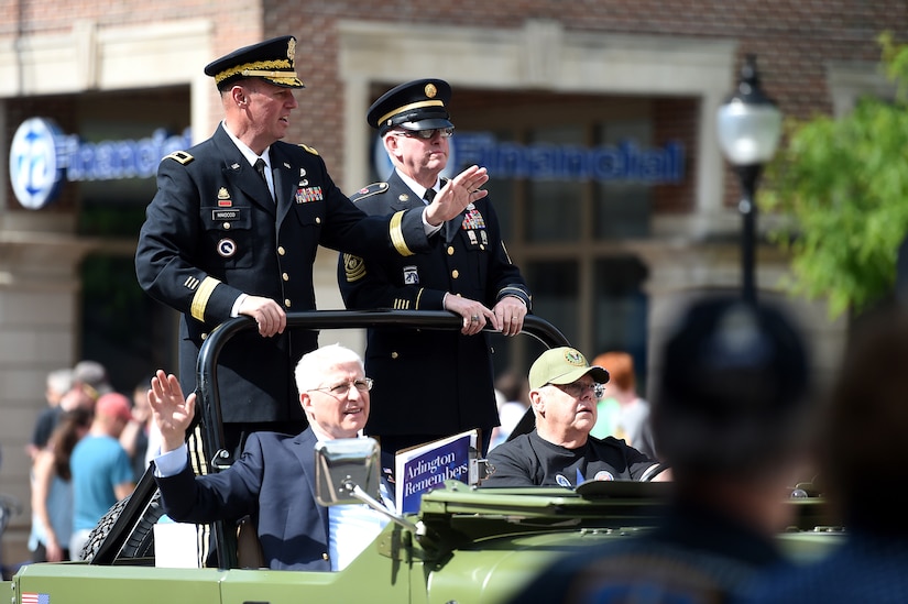U.S. Army Reserve Brig. Gen. Frederick R. Maiocco Jr., (left) Commanding General, 85th Support Command, and Command Sgt. Maj. Vernon Perry III (right) Command Sergeant Major, 85th Support Command, wave to a crowd at the Village of Arlington Heights’ Memorial Day parade on May 29, 2017. Arlington Heights was the last city in a three-day Memorial Day commemoration that Maiocco and Perry participated in the Chicago-land area. Both Maiocco and Perry said they were humbled by the amount of people who turned out to the events to show their support for the men and women who wear the uniform as well as the Gold Star Families.
(U.S. Army photo by Sgt. Aaron Berogan/Released)
