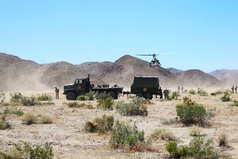 Marines with Marine Wing Support Squadron (MWSS) 373 prepare to refuel a UH-1Y Huey at an field aircraft refuel point (FARP) during Integrated Training Exercise (ITX) 3-17 on Marine Corps Air Ground Combat Center Twentynine Palms, Calif., May 17. ITX is a combined-arms training exercise enabling Marines across 3rd Marine Aircraft Wing to operate as an aviation combat element integrated with ground and logistics combat elements as a Marine air-ground task force. More than 650 Marines and 27 aircraft with 3rd MAW are supporting ITX 3-17. (U.S. Marine Corps photo by Sgt. David Bickel/Released)