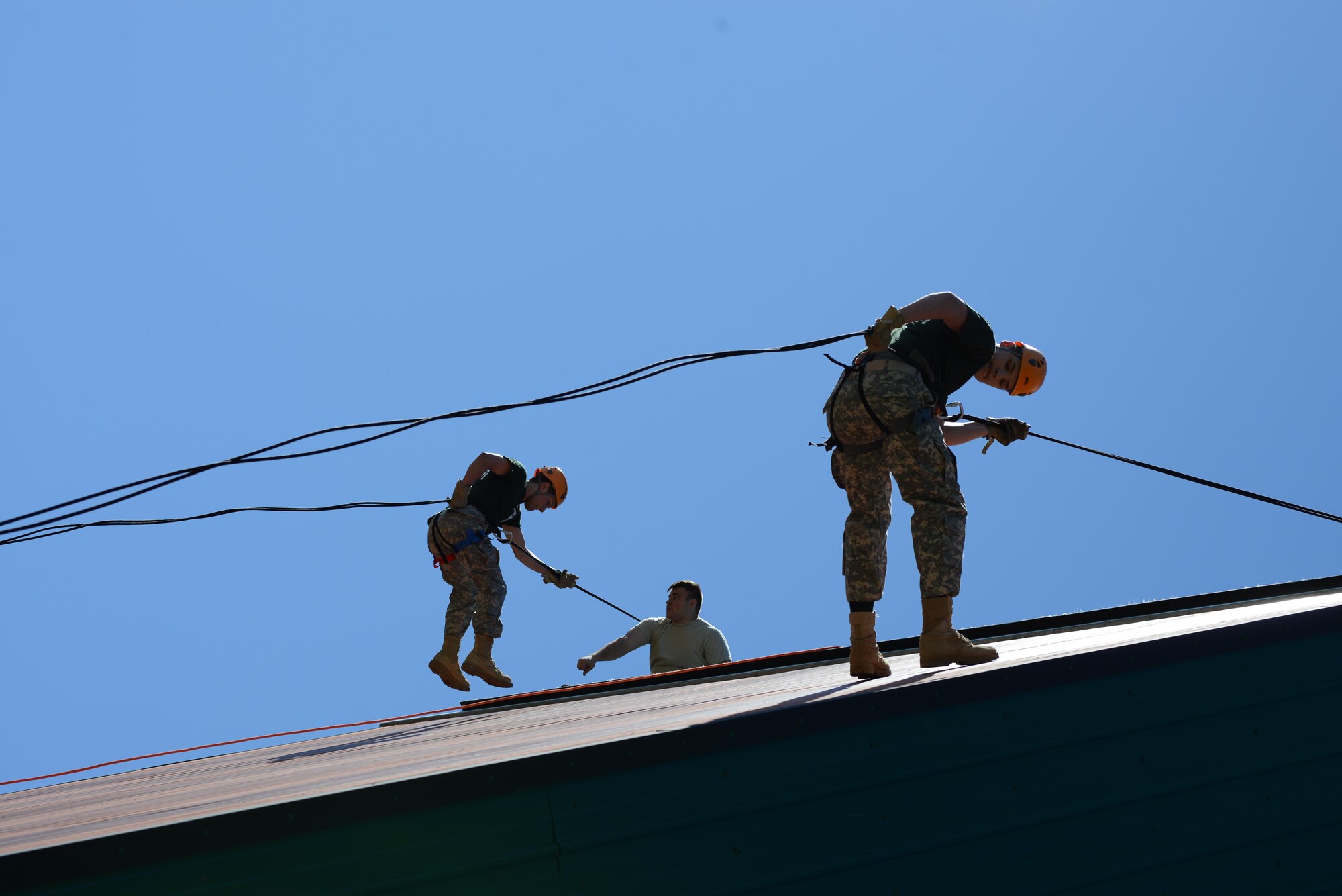East, Bartlett, and Colony high schools students rappel from the jump tower near Joint Base Elmendorf-Richardson’s Camp Carroll during the 2017 Summer Leadership Camp May 30, 2017. More than 200 cadets from seven area high schools are scheduled to participate in the camp hosted from May 30 to June 9. 