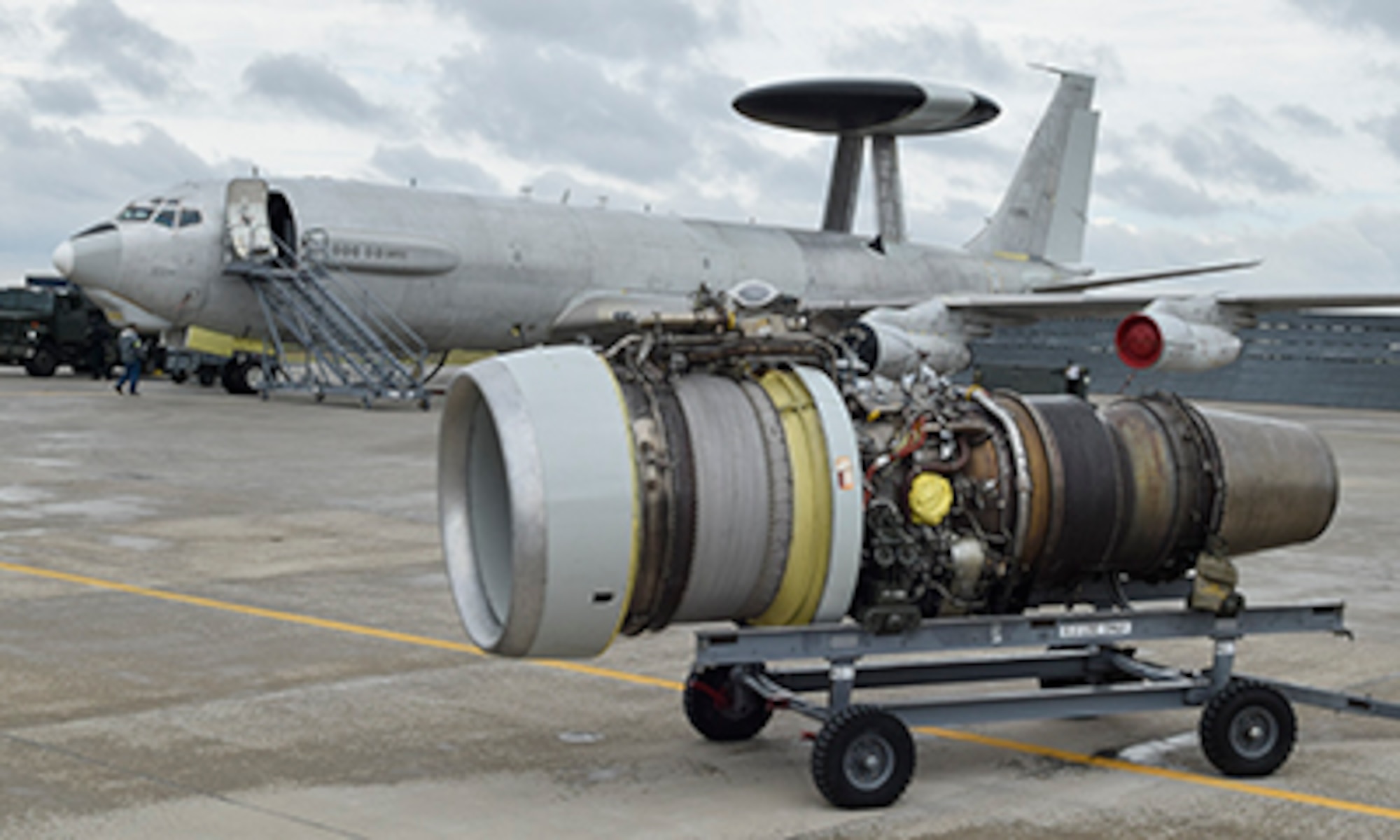 A Pratt & Whitney TF33 engine sits on a transport cart at the Oklahoma city Air Logistics Complex May 23, 2017, Tinker Air Force Base, Oklahoma. The TF33 shown is the type which powers the E-3 Airborne Warning and Control System and is one of the oldest engine families in the U.S. Air Force inventory. (U.S. Air Force photo/Greg L. Davis)