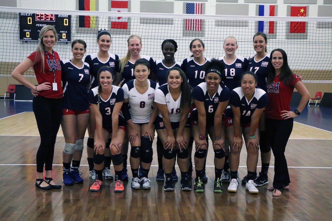 U.S. Armed Forces Team before their match against Canada during the 18th Conseil International du Sport Militaire (CISM) World Women's Military Volleyball Championship at Naval Station Mayport, Florida on 5 June 2017. Mayport is hosting the CISM Championship from 2-11 June.  Finals are on 9 June. 
Left to Right: Back Row: Head Coach Mrs. Kara Lanteigne, Capt. Caroline Kurtz (USAF), 1st Lt. Megan Wilton (Army), 2nd lt. Taylor Parker (USAF), 1st Lt. Felicia Clement (USAF), Seaman Mary Lavery (USCG), Capt Abby Hall (USAF), 1st Lt. Molly McDonald (Army), Assistant Coach Mrs. Anna Renton; Front Row: Ensign Kirsten Kelso (Navy), 1st Lt. Maiya Perich (USAF), Seaman Denise Atualeavao (Navy), Sgt. Latoya Marshall (Army), and Petty Officer 3rd Class Angelina Pulu.