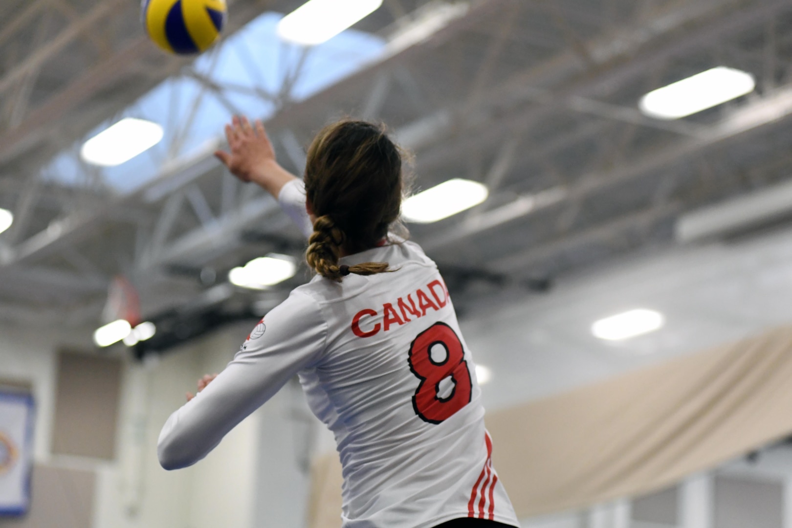 Canada's Middle Blocker Vanessa St. Georges serves in match 4 of the 18th Conseil International du Sport Militaire (CISM) World Women's Military Volleyball Championship at Naval Station Mayport, Florida on 5 June 2017. Mayport is hosting the CISM Championship from 2-11 June.  Finals are on 9 June.