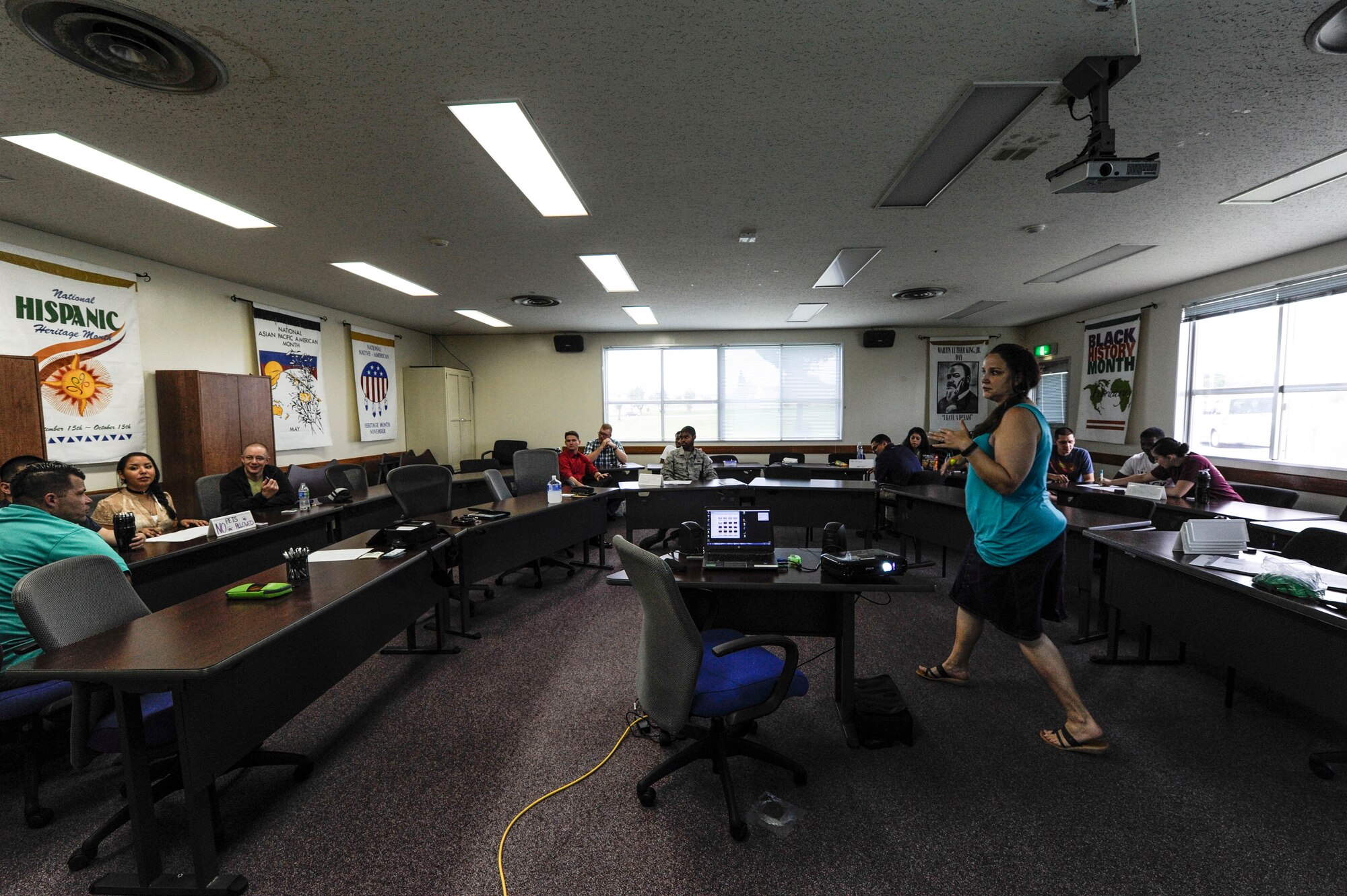 Gena Schneider, right, 18th Wing Specialist for Primary Prevention of Violence, leads Shogun members through Green Dot Key Influencer Training May 24, 2017, at Kadena Air Base, Japan. Green Dot is the Air Force’s program to prevent power-based interpersonal violence using a proactive approach to community awareness. (U.S. Air Force photo by Senior Airman Lynette M. Rolen)
