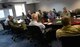 Participants of the Conventional Armed Forces in Europe Challenge Inspection Tabletop Exercise discuss roles and expectations of each agency, June 2, 2017, on RAF Mildenhall, England. The exercise included members from RAF Mildenhall, RAF Lakenheath, RAF Alconbury, and personnel from the Joint Arms Control Implementation Group. The Arms Control Treaty Compliance Officer led the event to ensure preparedness of all agencies. (U.S. Air Force photo by Senior Airman Justine Rho)