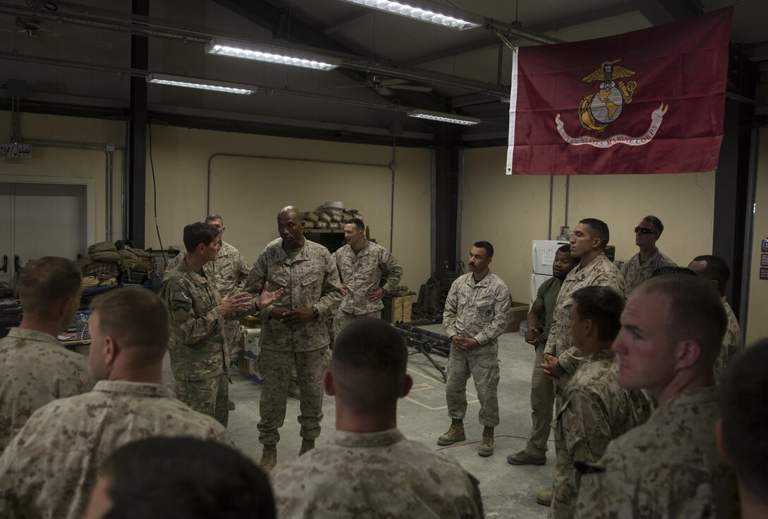 Col. David Gibbs, center-left, commanding officer for team police, Task Force Southwest, speaks with General Joseph Votel, commander of U.S. Central Command, at Bost Airfield, Afghanistan, June 2, 2017. The general visited Bost as part of his battlefield circulation to Helmand, Province. Task Force Southwest, comprised of approximately 300 Marines and Sailors from II Marine Expeditionary Force, is training, advising and assisting the Afghan National Army 215th Corps and the 505th Zone National Police. (U.S. Marine Corps photo by Sgt. Justin T. Updegraff)