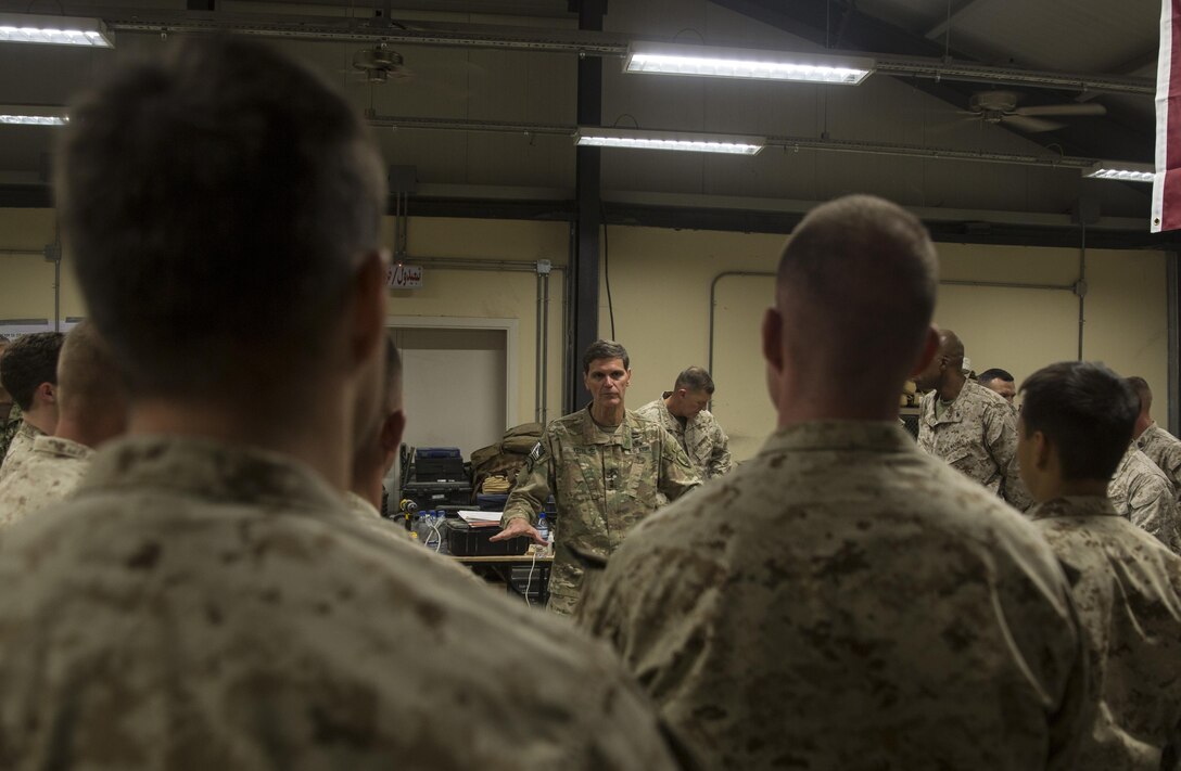General Joseph Votel, commander of U.S. Central Command, speaks with U.S. Marine advisors with Task Force Southwest at Bost Airfield, Afghanistan, June 2, 2017. The general visited Bost as part of his battlefield circulation in Helmand Province. Task Force Southwest, comprised of approximately 300 Marines and Sailors from II Marine Expeditionary Force, is training, advising and assisting the Afghan National Army 215th Corps and the 505th Zone National Police. (U.S. Marine Corps photo by Sgt. Justin T. Updegraff)