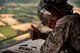 U.S. Air Force Senior Airman Chasady Harris, 86th Operations Support Squadron aircrew flight equipment journeyman, gives a “thumbs up” while laying on the ramp of a C-130J Super Hercules assigned to the 37th AS at Ramstein Air Base, Germany, during a flyover in Normandy, France, June 2, 2017. The flyover commemorates the 73rd anniversary of D-Day, the largest multinational amphibious landing and operational military airdrop in history, and highlights the U.S.' steadfast commitment to European allies and partners. Overall, approximately 400 U.S. service members from units in Europe and the U.S. are participating in ceremonial D-Day 73 events from May 31-June 7, 2017. (U.S. Air Force photo by Senior Airman Devin Boyer)