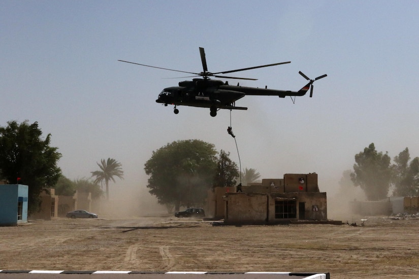 Iraqi special operations forces soldiers rappel out of an Iraqi helicopter during a demonstration by the Special Tactics Unit for Iraqi and coalition commanders in Baghdad, May 24, 2017. Army photo by Capt. Joseph M. Booth