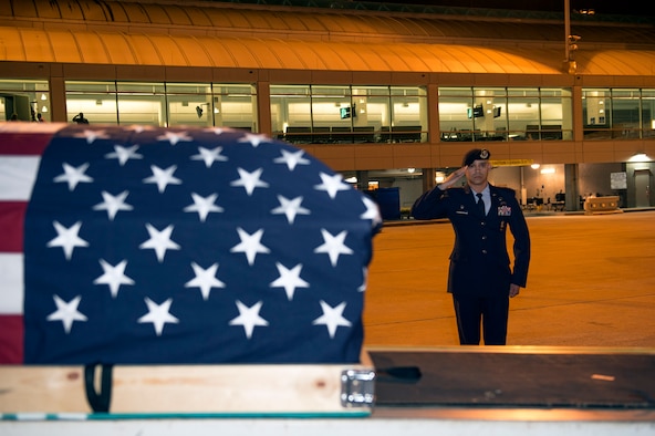 Lt. Col. José Antonio Lebrón, Joint Task Force-Bravo joint security forces commander, Soto Cano Air Base, Honduras, salutes his nephew’s, Senior Airman Gabriel Antonio Fuentes Lebrón, 18th Security Forces Squadron, Kadena Air Base, Japan, casket during a dignified arrival in Jacksonville, Fla., May 30, 2017. A dignified arrival is the process by which, upon the return from the theater of operations to the United States, the remains of fallen military members are transferred from an aircraft to a waiting vehicle and then to the port mortuary. Lebrón passed away in Okinawa, May 19. (U.S. Air Force photo by Senior Airman Greg Nash)