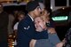 Airman 1st Class Jomalier Viera-Martinez, 18th Security Forces Squadron, Kadena Air Base, Japan, embraces Ileana Bonilla, grandmother of deceased Senior Airman Gabriel Antonio Fuentes Lebrón, 18th SFS, during a designated arrival in Jacksonville, Fla., May 30, 2017. A dignified arrival is the process by which, upon the return from the theater of operations to the United States, the remains of fallen military members are transferred from an aircraft to a waiting vehicle and then to the port mortuary. Lebrón passed away in Okinawa, May 19. (U.S. Air Force photo by Senior Airman Greg Nash)