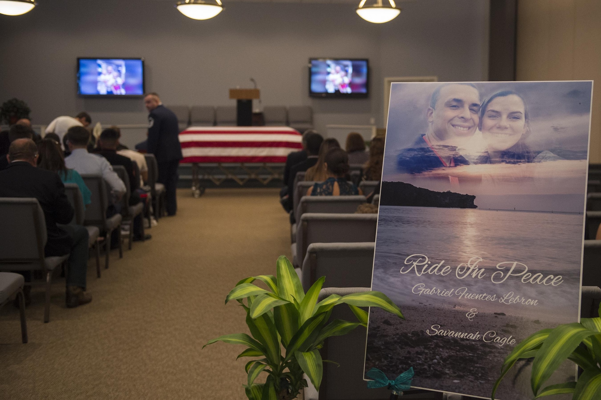 Family, friends and comrades file in to mourn during a funeral for deceased Senior Airman Gabriel Antonio Fuentes Lebrón, 18th Security Forces Squadron, Kadena Air Base, Japan, in Orange Park, Fla., June 1, 2017. Lebrón’s most recent accomplishment was being selected for promotion to Senior Airman Below The Zone, March 23, and was posthumously promoted on the day of his passing, May 19. He leaves behind his parents, older brother, Miguel Angel, sisters Michelle and Valerie, niece, Ileana, as well as countless family members and friends. (U.S. Air Force photo by Senior Airman Greg Nash)