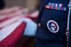 An honor guardsman holds a flag during a funeral for deceased Senior Airman Gabriel Antonio Fuentes Lebrón, 18th Security Forces Squadron, Kadena Air Base, Japan, in Orange Park, Fla., June 1, 2017. Moody’s honor guard performs congressionally mandated honors throughout 51 counties within Southern Georgia and Northern Florida. Moody’s honor guard, also known as the Knights of Honor, are comprised of up to 25 active duty Airmen. (U.S. Air Force photo by Senior Airman Greg Nash) 