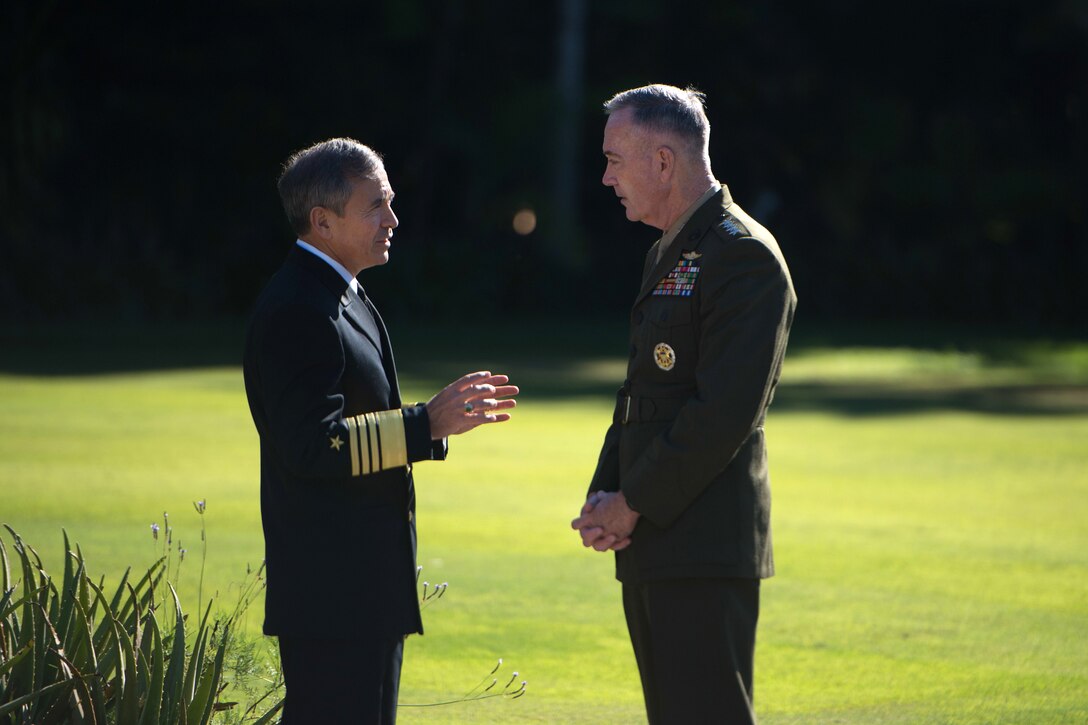 Marine Corps Gen. Joe Dunford, right, chairman of the Joint Chiefs of Staff, and Navy Adm. Harry Harris, commander of U.S. Pacific Command, talk in the gardens of the New South Wales Government House in Sydney, June 5, 2017. DoD photo by Air Force Staff Sgt. Jette Carr