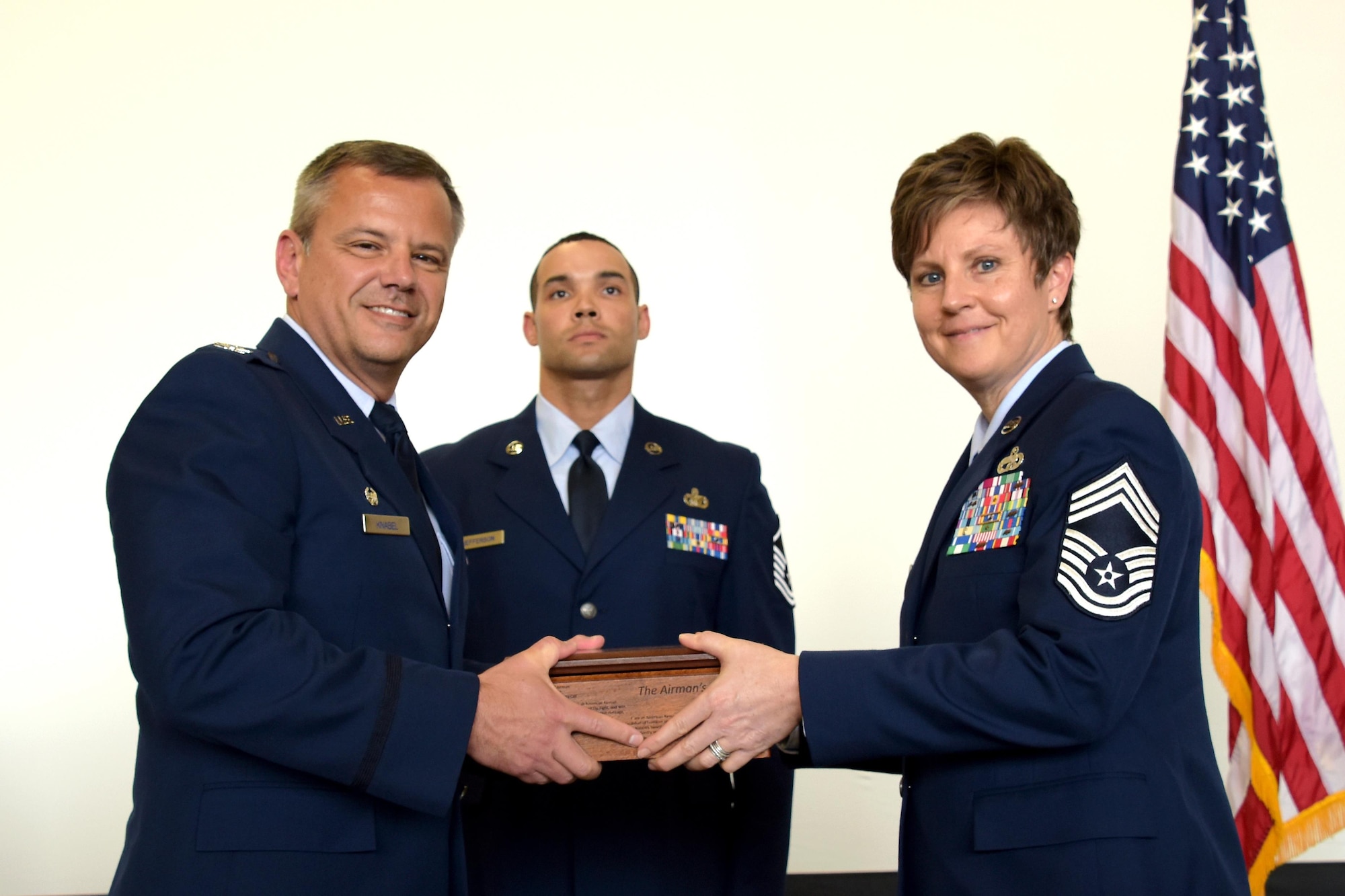 Chief Master Sgt. Heidi Bunker, assumes her new position as the 178th Wing Command Chief during a change of responsibility ceremony at Springfield Air National Guard Base in Ohio, June 3, 2017. Bunker is the seventh command chief, and the first female to hold the position at the 178th Wing. (Ohio Air National Guard photo by Senior Airman Rachel Simones)