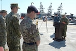 Lt. Cmdr. Joseph Reardon, Naval Support Activity (NSA) Bahrain Chaplain, speaks to Sailors at a Battle of Midway commemoration ceremony held at NSA Bahrain June 5, 2017. The ceremony commemorated the Sailors and Marines lost during the Battle of Midway. (U.S. Navy Photo by Mass Communication Specialist 2nd Class Gregory A. Pickett II/Released)