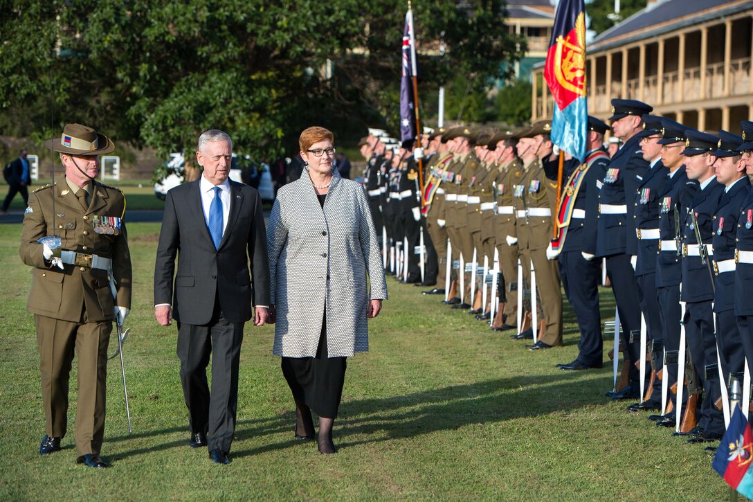 Defense Secretary Jim Mattis, center, and Australian Defense Minister Marise Ann Payne review the troops.