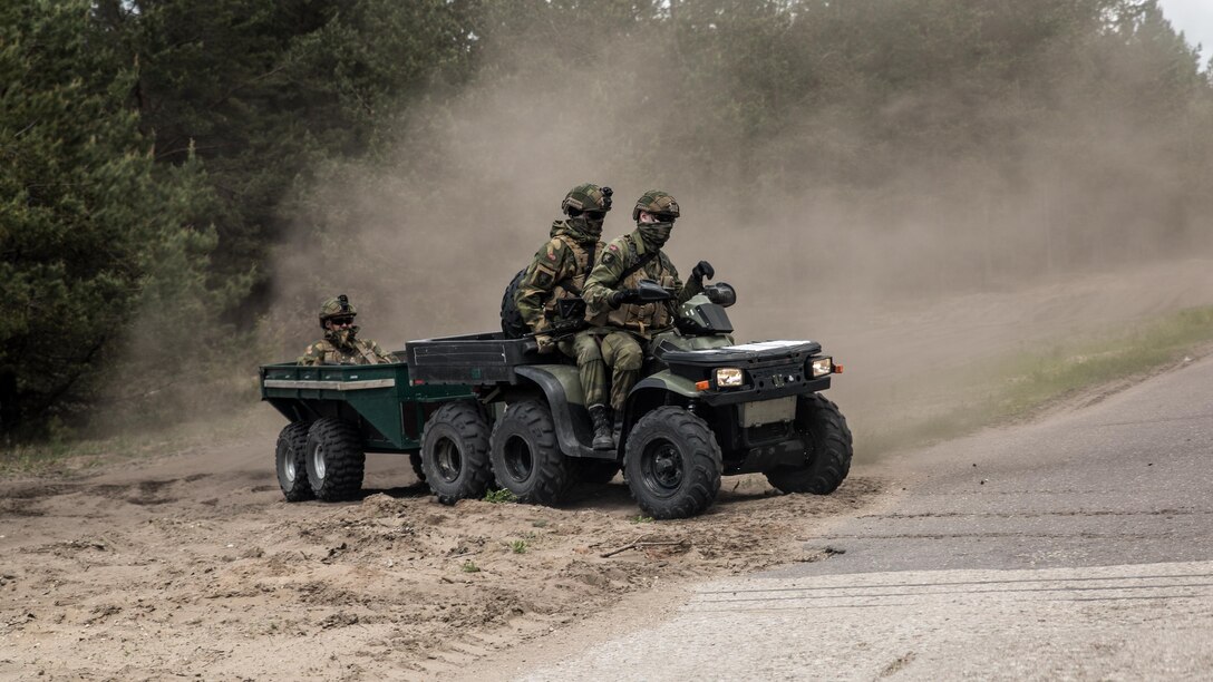 Soldiers of the Norwegian Armed Forces drive through training areas surrounding Camp Adazi, Latvia, during preparation for Exercise Saber Strike 17, June 2, 2017.  Exercise Saber Strike 17 is an annual combined-joint exercise conducted at various locations throughout the Baltic region and Poland. The combined training prepares NATO Allies and partners to effectively respond to regional crises and to meet their own security needs by strengthening their borders and countering threats. 