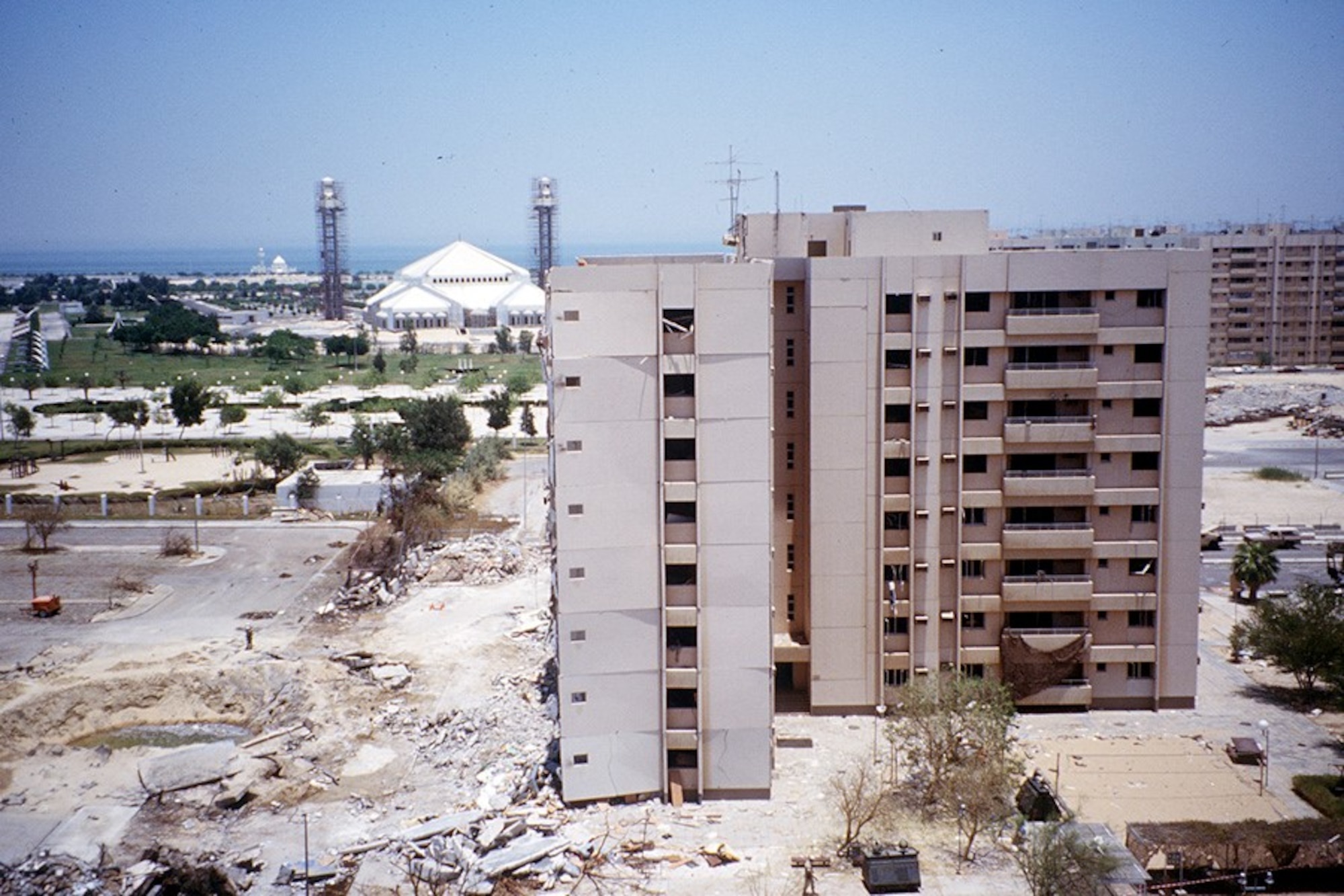 View from the balcony near 1st Lt Michael Harner’s room of the aftermath of the blast. The crater was 85 feet wide, and 35 feet deep. (Courtesy Photo) 