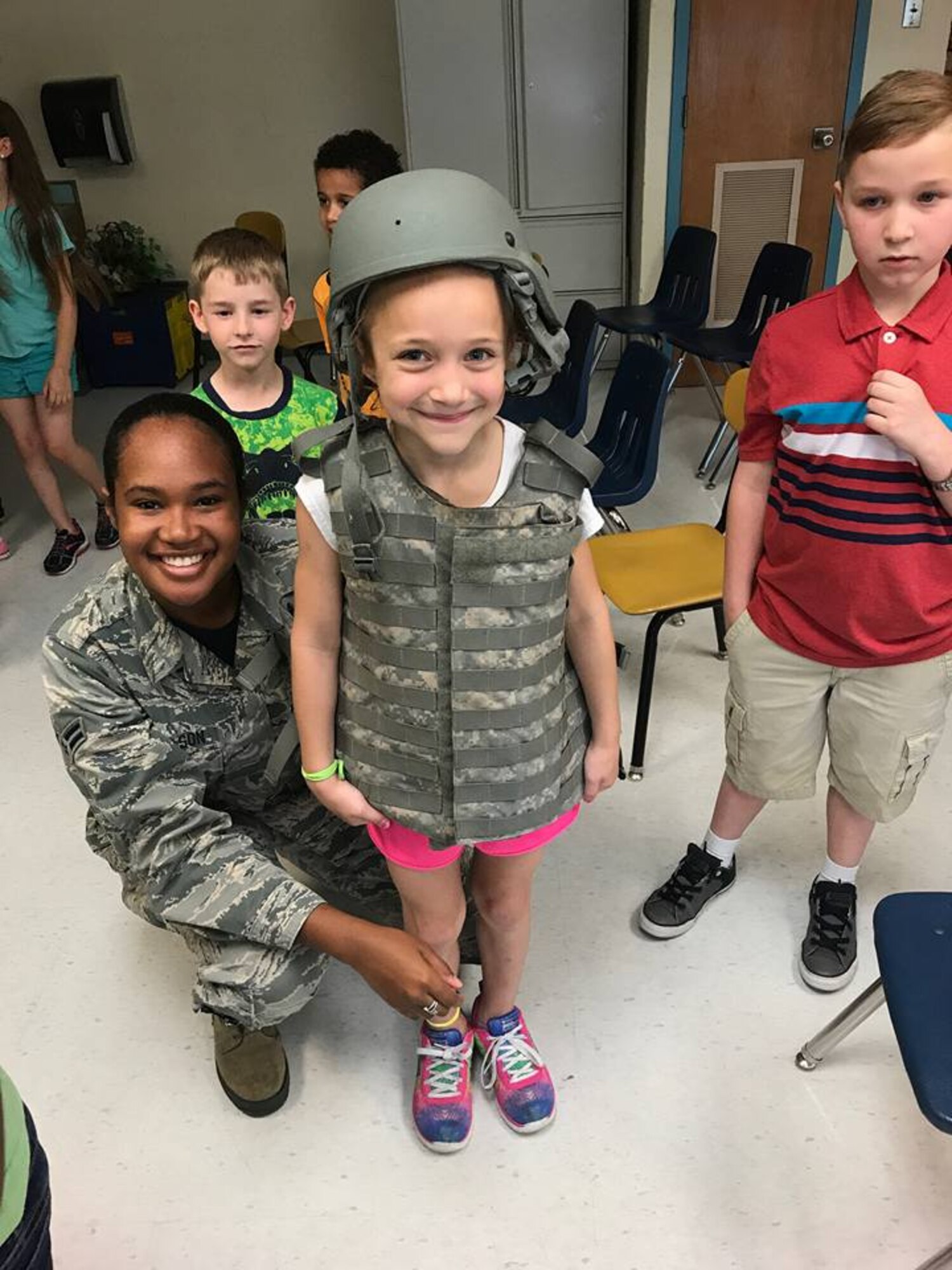 Airman 1st Class Alicia Nicholson, 436th Logistics Readiness Squadron log plans apprentice, shows Welch Elementary School children readiness equipment during Military Appreciation Day on May 19th, 2017. The Airmen briefed over 340 kids from the school on what military logisticians do and what equipment is used for the 436th LRS mission. (Courtesy photo)