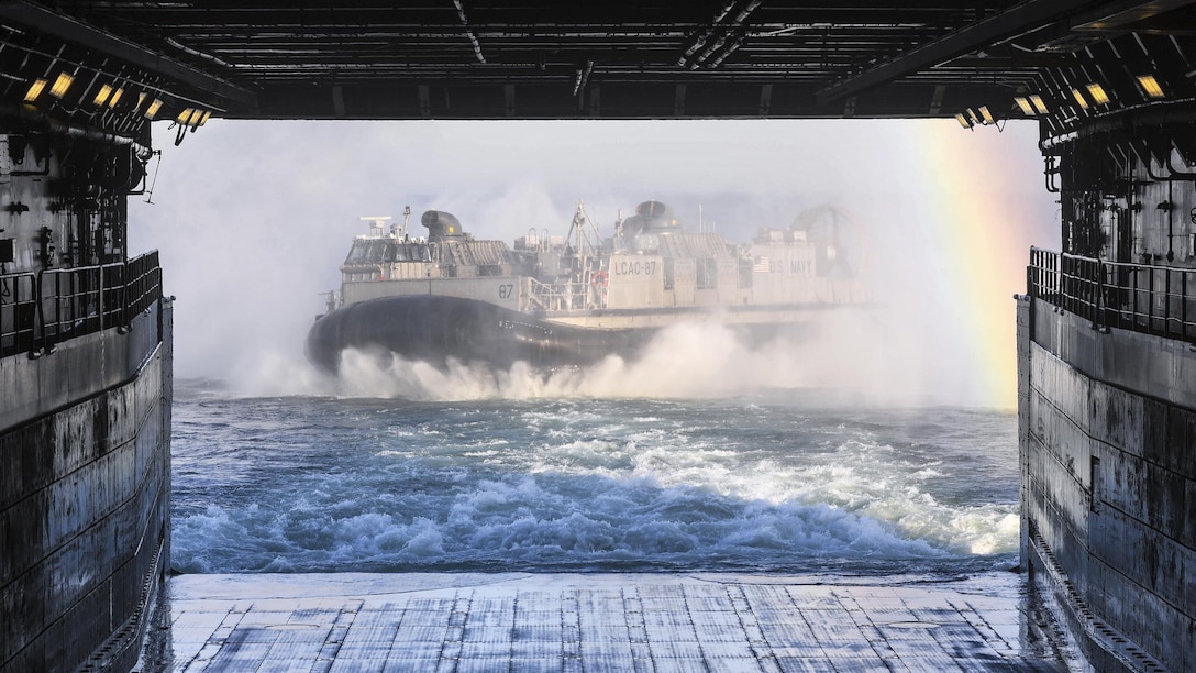 A Navy air-cushion landing craft departs the well deck of the USS Arlington during a beach landing in Ventspils, Latvia, June 6, 2017, as part of  exercise Baltops 2017. The annual exercise in the Baltic Sea region aims to enhance flexibility and interoperability among its participants. Navy photo by Petty Officer 3rd Class Ford Williams