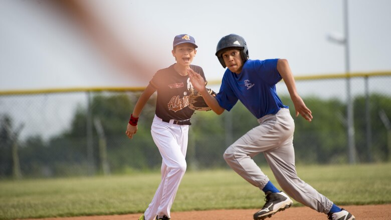 Players from the Aviano Tigerz and Junior Alpina baseball teams play baseball June 3, 2017, at Aviano Air Base, Italy. In this goodwill game, winning or losing did not matter, it was about making new and long-lasting relationships. (U.S. Air Force photo by Senior Airman Cory W. Bush)