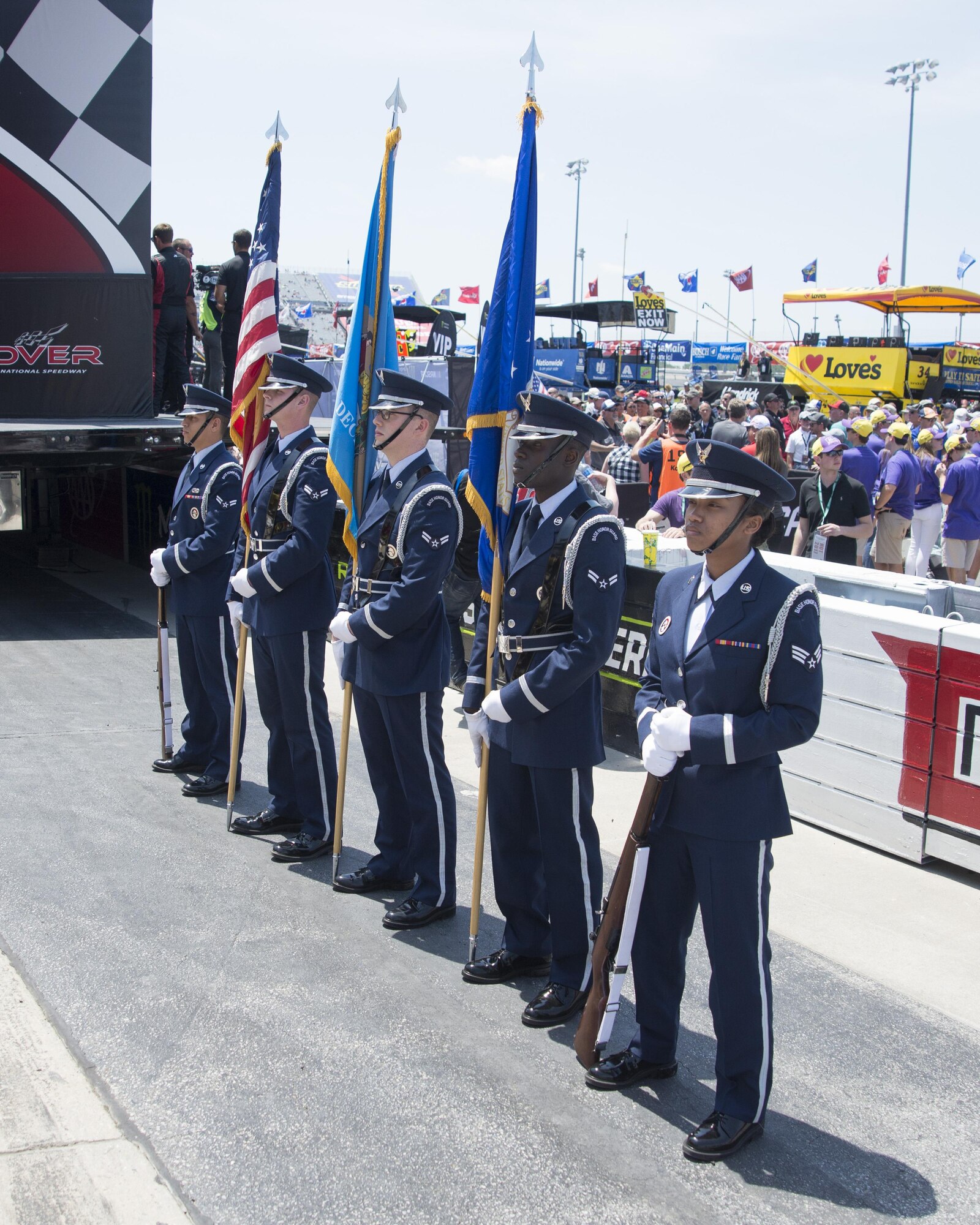 Dover Air Force Base Honor Guard color team are posted during pre-race ceremonies of the AAA 400 Drive for Autism Monster Energy race June 4, 2017, at Dover International Speedway, Dover, Del. The honor guard team presented colors during the singing of the national anthem. (U.S. Air Force photo by Staff Sgt. Jared Duhon)