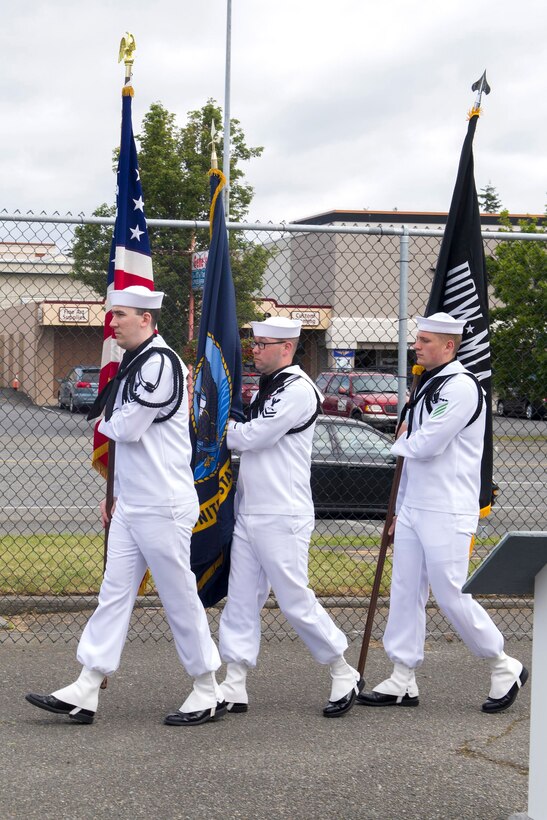 A Navy color guard presents the colors during a ceremony commemorating the 75th anniversary of the Battle of Midway at the PBY-Naval Air Museum in Oak Harbor, Wash., June 2, 2017. Navy photo by Petty Officer 2nd Class Scott Wood