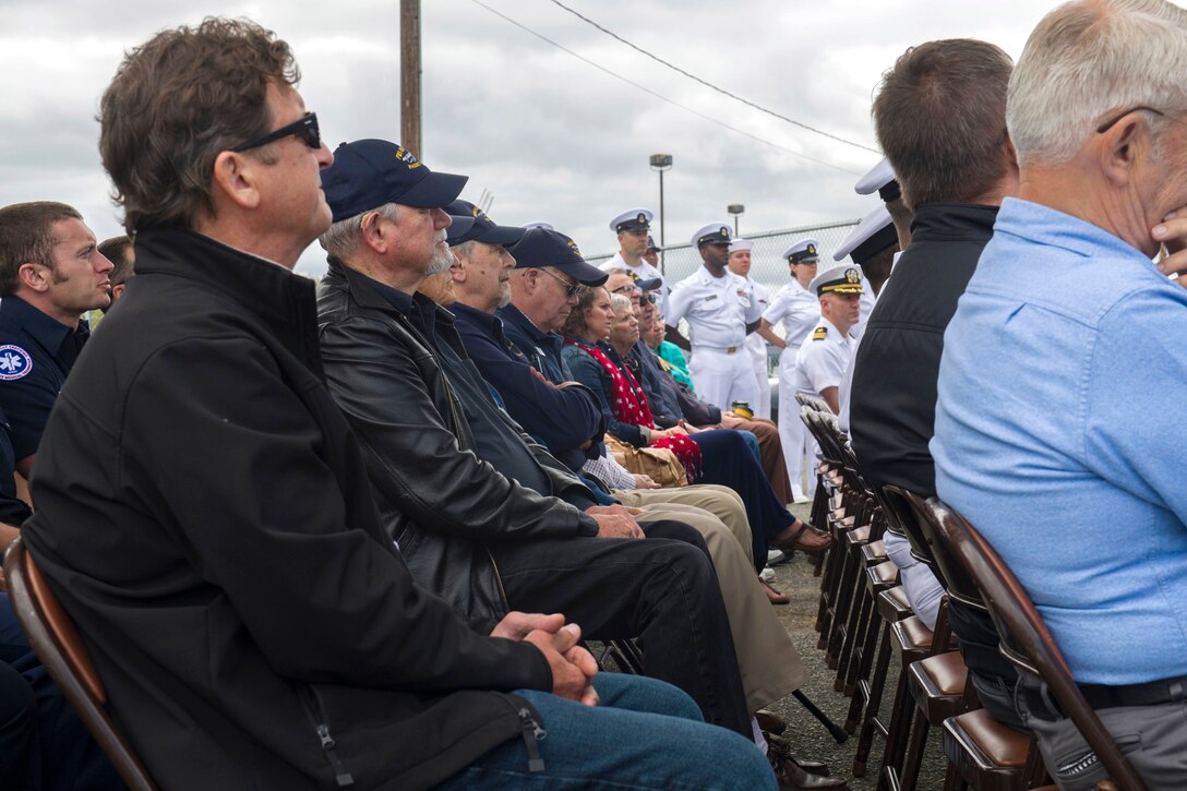 Service members, veterans and civilians listen to remarks during a ceremony commemorating the 75th anniversary of the Battle of Midway at the PBY-Naval Air Museum in Oak Harbor, Wash., June 2, 2017. Navy photo by Petty Officer 2nd Class Scott Wood