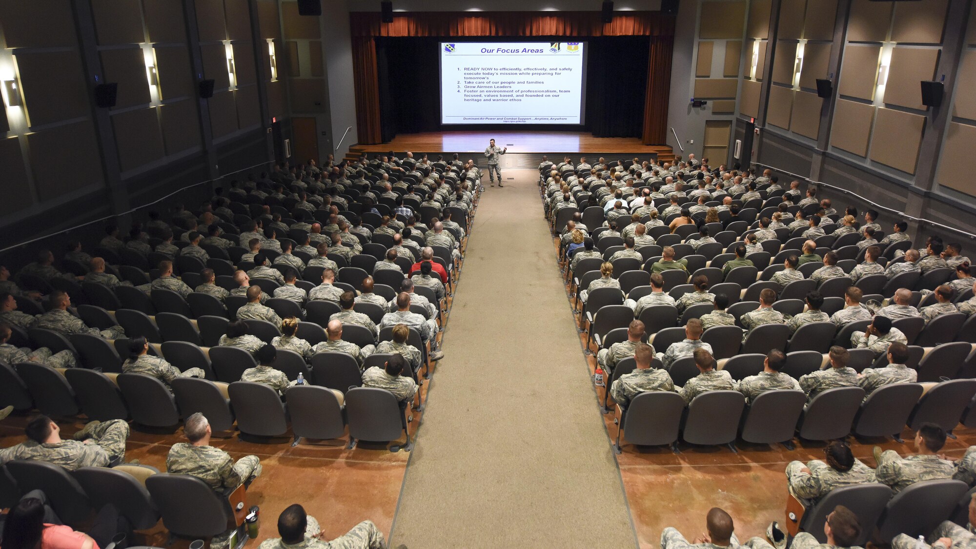 U.S. Air Force Col. David Benson, 7th Bomb Wing commander, addresses Team Dyess during his final commander’s call at Dyess Air Force Base, Texas, June 5, 2017. He highlighted Team Dyess' accomplishments and thanked them for being great wingmen and teammates. (U.S. Air Force photo by Senior Airman Kedesha Pennant)
 
