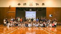 HONG KONG (April 10, 2017) U.S. Marines and Sailors with the Makin Island Amphibious Ready Group/11th Marine Expeditionary Unit pose for a photo with children from Yan Chai Hospital Law Chan Chor Si Primary School in Hong Kong  as part of a community relations event, April 10. During the event, Marines and Sailors shared stories about ship life, participated in several team games and sang along to “It’s a Small World” with the children. While visiting various ports, the service members aboard USS Makin Island are given the opportunity to partake in tours, recreational activities, and community relation events to experience the nation’s culture. (U.S. Marine Corps photo by Cpl. April L. Price)
