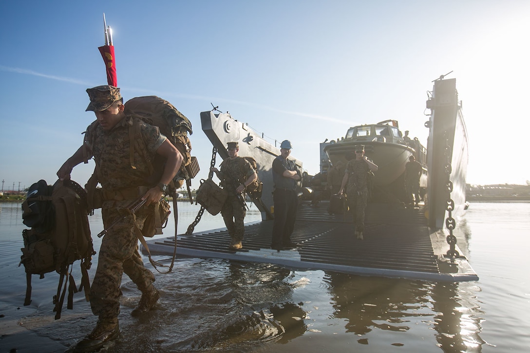 U.S. Marines with the 11th Marine Expeditionary Unit disembark a Landing Craft Utility (LCU) at Camp Pendleton, Calif., May 13, 2017. The 11th MEU Marines and Sailors landed ashore over three days via Landing Craft Air Cushion, Combat Rubber Raiding Crafts, LCUs, Amphibious Assault Vehicles, and aircraft after their Western Pacific Deployment 16-2. The 11th MEU served a seven-month deployment to the Western Pacific, Middle East, and Horn of Africa. (U.S. Marine Corps photo by Sgt. Xzavior T. McNeal)